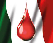 Sullo sfondo di un tricolore dell'Italia una goccia simbolica di sangue