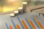 Grafico economico con pile di monete (foto Advantus Media Inc. and QuoteInspector.com)